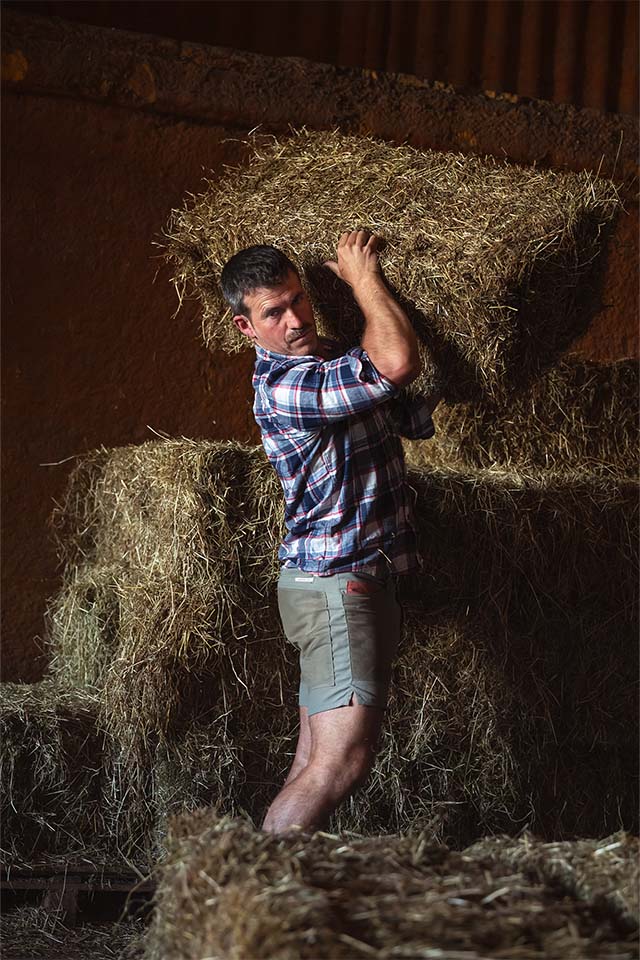 Wild Acre Man Farmer Lifting Hay | Etna Studios